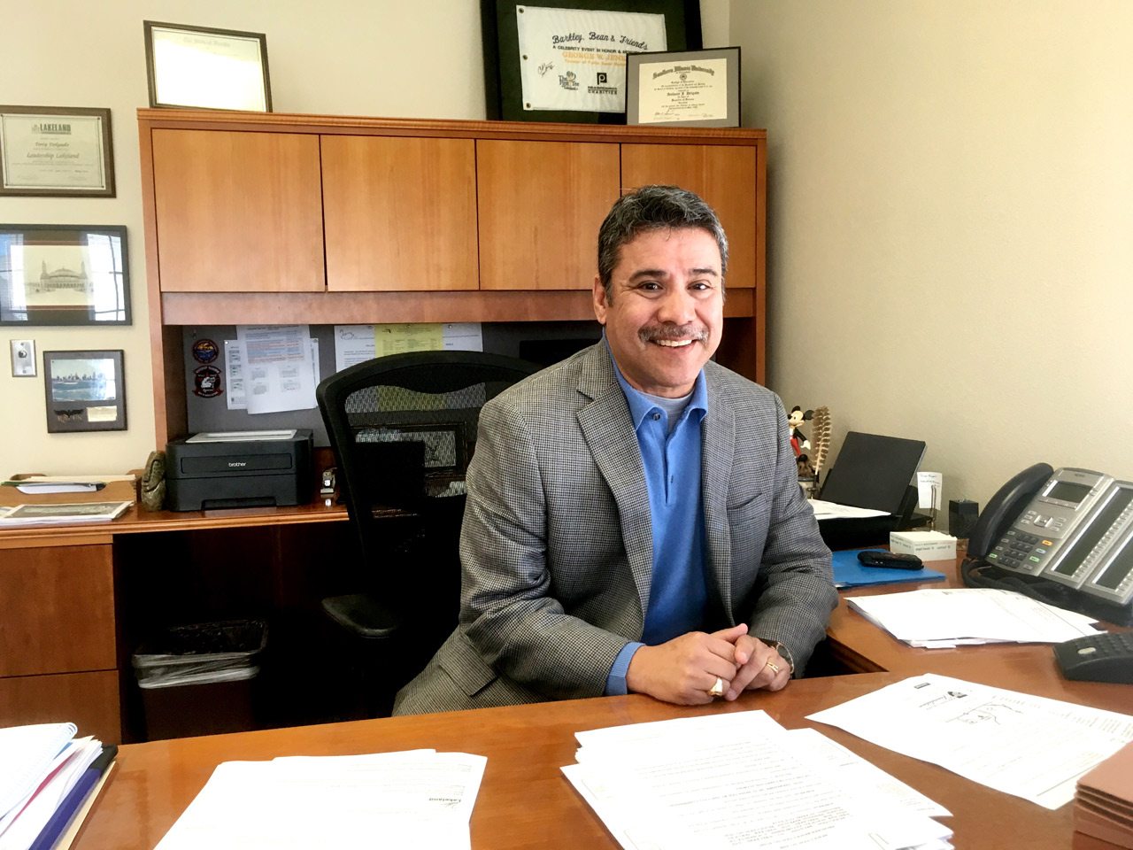 Tony Delgado at his desk