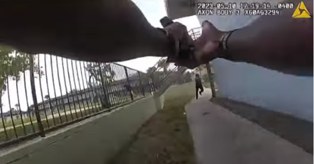 Police body-cam footage shows Lakeland Police Officer Jamie Smith shooting back at a suspect who shot him in the foot.
