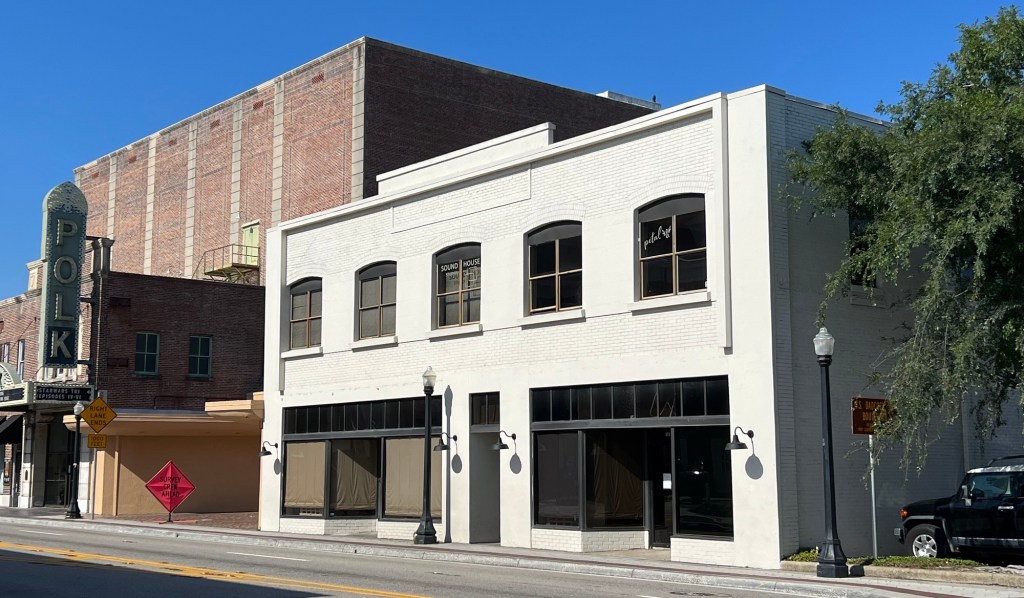 The W. Fisk Jonson Building in April, more than a year after its yellow and orange bricks were painted white.